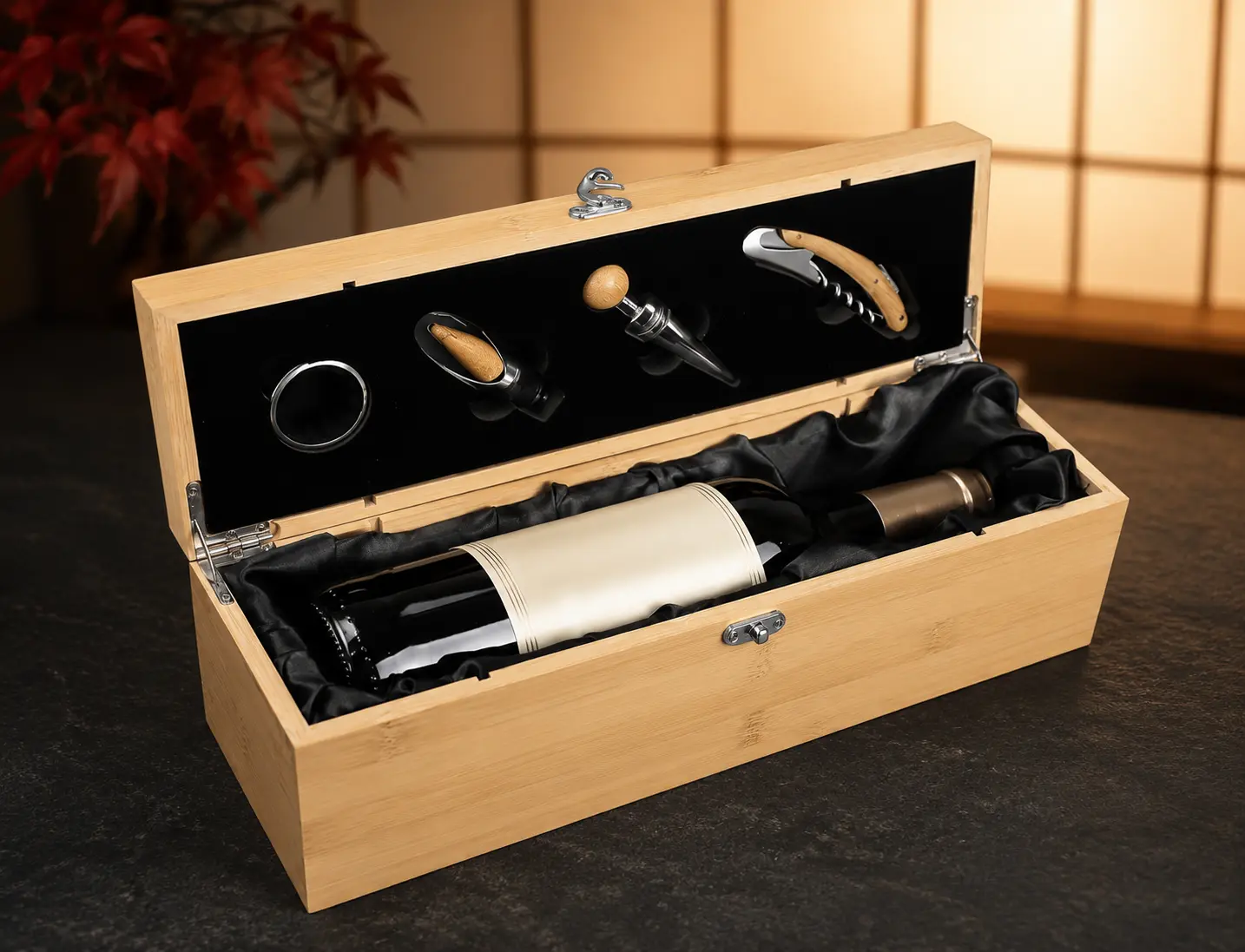 Open bamboo wine presentation box showing fitted wine accessories and a wine bottle for illustration